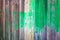 Background - vertical wood board with green stain