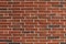 Background wall featuring long thin bricks with finely combed surface, clean mortar