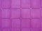 Background of wall  made of purple square tiles