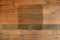 Background. Wet square stain on the yellow wood. Light brown wooden background. Place for text.