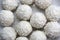 Background of white sweet balls with coconut