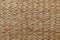 Background wickerwork from banana leaves, abstract, light brown