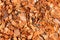 Background of wood chips scattered orange