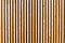 Background of wooden boards, slats. Modern architecture, urban.