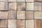 Background of wooden boards. wooden background - square format. pieces of teak wood stump background. wooden panel materials for