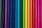 Background of wooden colorful pencils of different colours. Rainbow order.