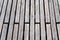 Background of wooden slats and boards on a boardwalk and dock on a lake