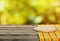 Background with wooden table with cutting board, close up