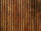 Background - wooden texture from palisades, advertising surface, reddish