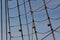 Background wrapped and sealed shroud from an old tallship, rope and chain against a beautiful blue sky