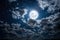 a backgrounds night sky with stars and moon and clouds. Elements of this image furnished by NASA
