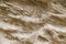 Backgrounds of textured sand