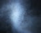 Backgroung image of a deep blue smoke and light
