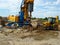 Backhoe and drilling machinery