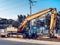 Backhoe to excavate the soil on ground  in the construction area