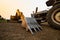 Backhoe and Tractor prepare land for cultivation