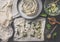 Backing preparation of savory pie with phyllo dough sheets stuffed with spinach and feta cheese on dark rustic background . Top