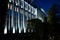 Backlit administrative building at night, photo of floodlights, building lighting, night illumination of houses in