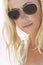 Backlit Blond Girl In Aviator Sunglasses
