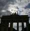 Backlit Brandenburg Gate in Berlin Germany with the silhouette