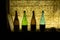 Backlit Colorful Glass Sake Bottles