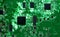 Backlit green printed circuit board background texture