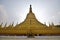 Backlit of main giant stupa of Shwemawdaw Pagoda surrounded with smaller stupas