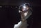Backlit night wedding couple kissing