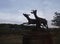 Backlit sculpture of deer in the field