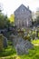 A backlit view of the ruins of the historic Greyabbey Monastery