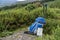 Backpack, binoculars, map and sticks on the mountain, mountain lifestyle in Ireland