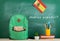 backpack, blackboard with text "hablas espaÃ±ol", flag of the Spain, books and school supplies