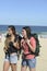 Backpacker arriving on the beach