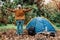 Backpacker Asian man standing open arms is freedom and relax on the weekends. holiday camping alone on vacation