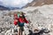 Backpacker crossing Ngozumpa glacier in Nepal.
