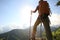 Backpacker enjoy the view on mountain peak