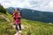 Backpacker girl in red dress