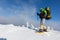 Backpacker is posing in winter mountains