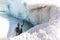 Backpacker tourist sitting resting frozen ice lake glacier, Bolivia travel.