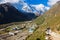 Backpacker walking mountain trail in Nepal.