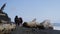 Backpacker walking on Rialto Beach Olympic National Washington