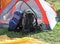 Backpacks of hikers resting above the tent