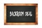 BACKROOM  DEAL text written on wooden frame school blackboard
