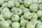 A backround of lots of green apples