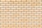 The backround or texture of ideal nice yellow, beige or brown brick wall of the building