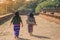 Backview of female tourists at ancient Pa Hto Taw Gyi Pagoda ruins at Mingun city