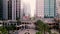 Backward motion view of Orlando downtown flyover of church street market