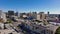 A backwards ascending shot of the skyscrapers, office buildings and apartments in the Hollywood cityscape