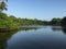 Backwater greenery blue sky water