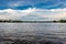 Backwater view with blue sky and white clouds